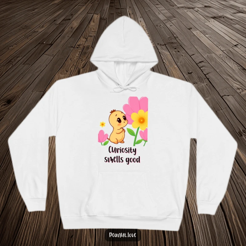 Funny Peanut Hoodie: A warm and cozy hoodie featuring a curious peanut character intently sniffing a beautiful, colorful flower.