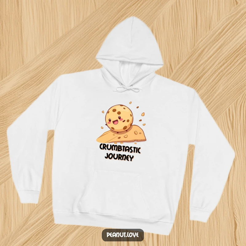 Funny cookie character joyfully rolling down a crumb-filled hill on a humorous hoodie, a great gift.