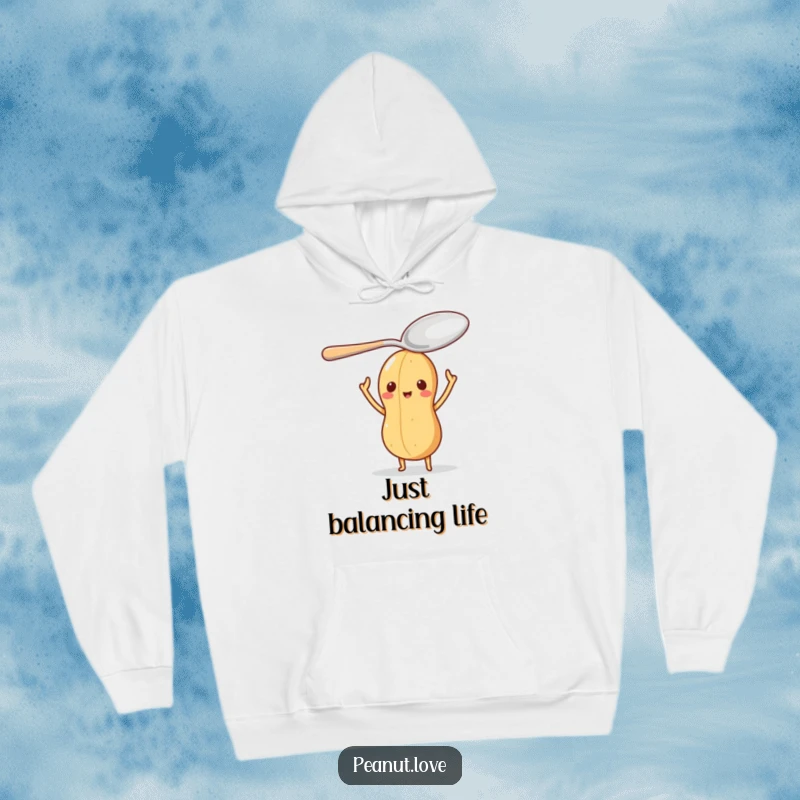 Funny hoodie featuring a peanut character with an oversized spoon balanced on its head, symbolizing steady focus.