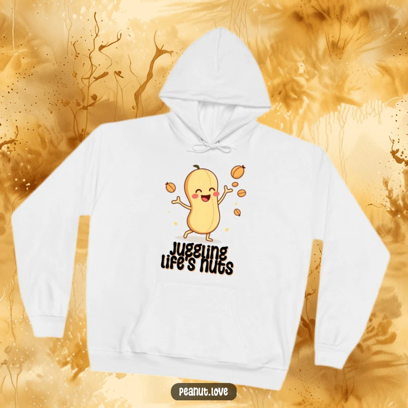 Funny hoodie depicting a playful peanut character juggling nuts with delight, offering cozy comfort and nutty entertainment.