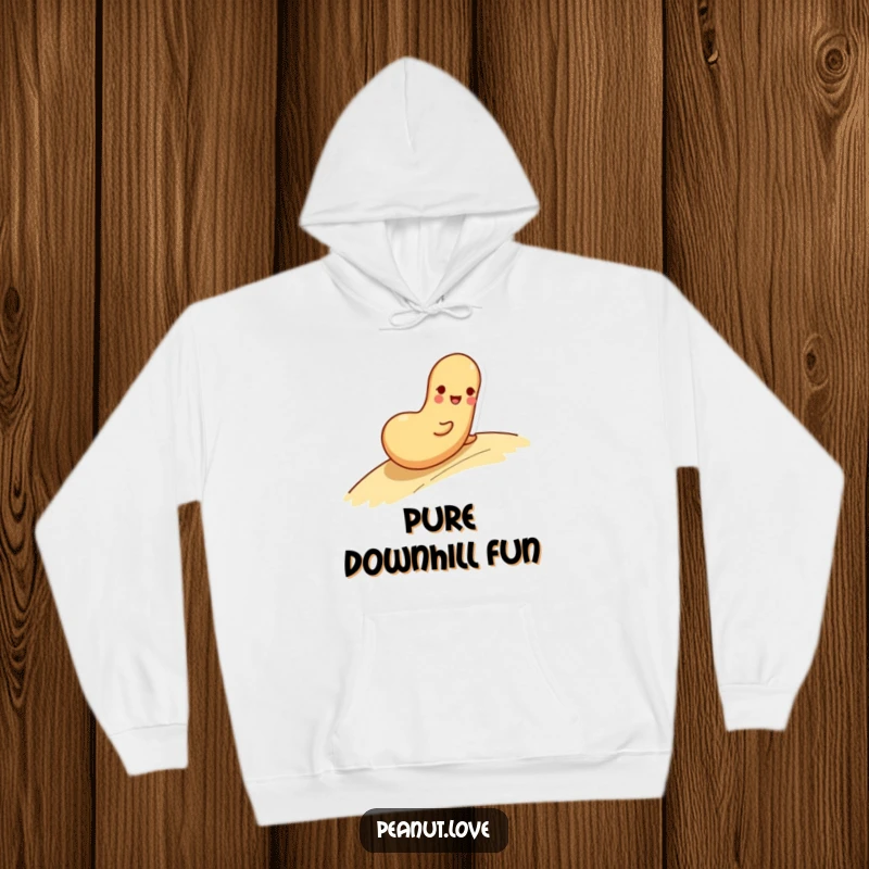 Funny hoodie with a playful peanut character rolling down a gentle slope, radiating happiness and relaxation.