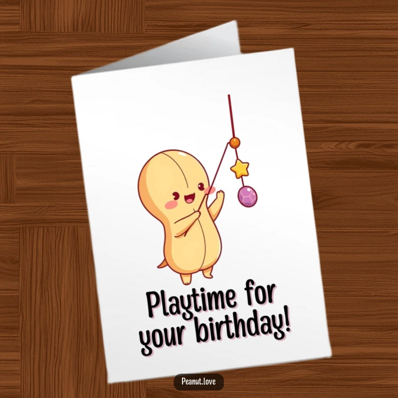 Funny Free Printable playful peanut character batting at a dangling string like a toy, ready for birthday games. Hilarious joy.