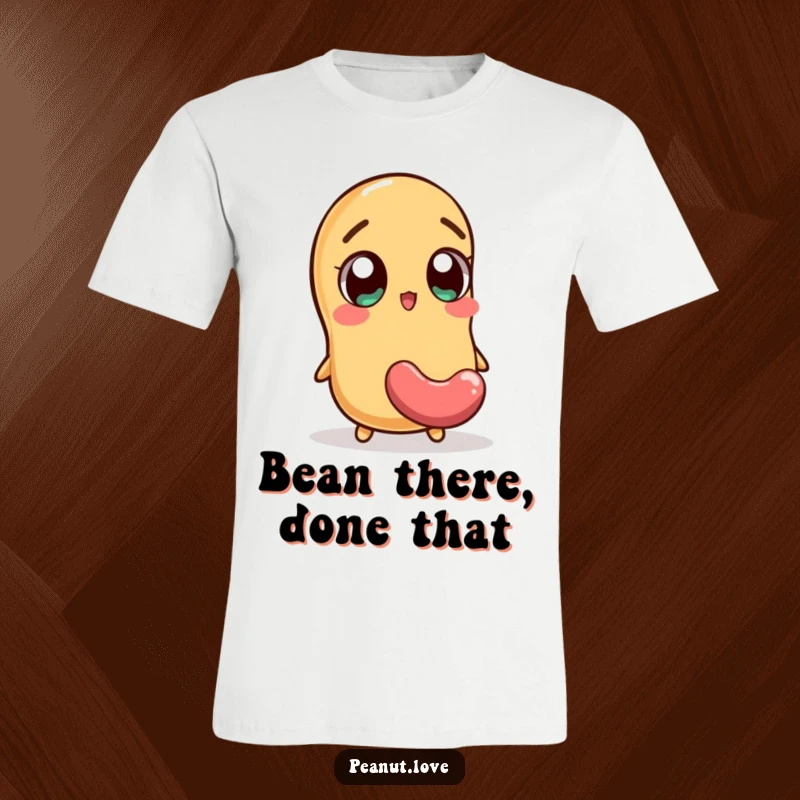 Funny t-shirt featuring an excited peanut character with wide eyes watching a jellybean fall, a humorous depiction of sweet anticipation.