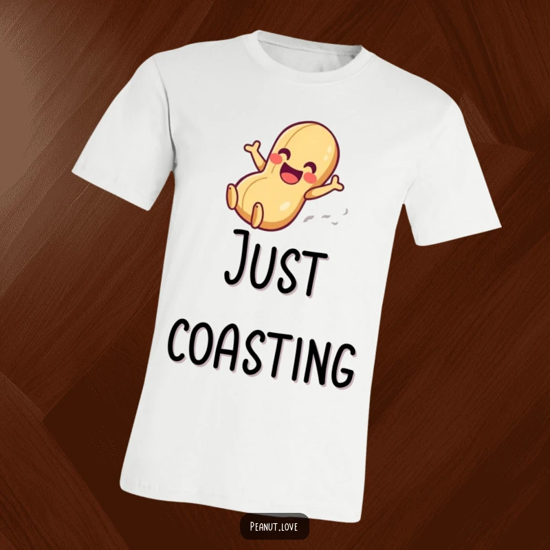 Funny t-shirt depicting a happy anthropomorphic peanut character gleefully sliding down a smooth surface, embodying pure fun.