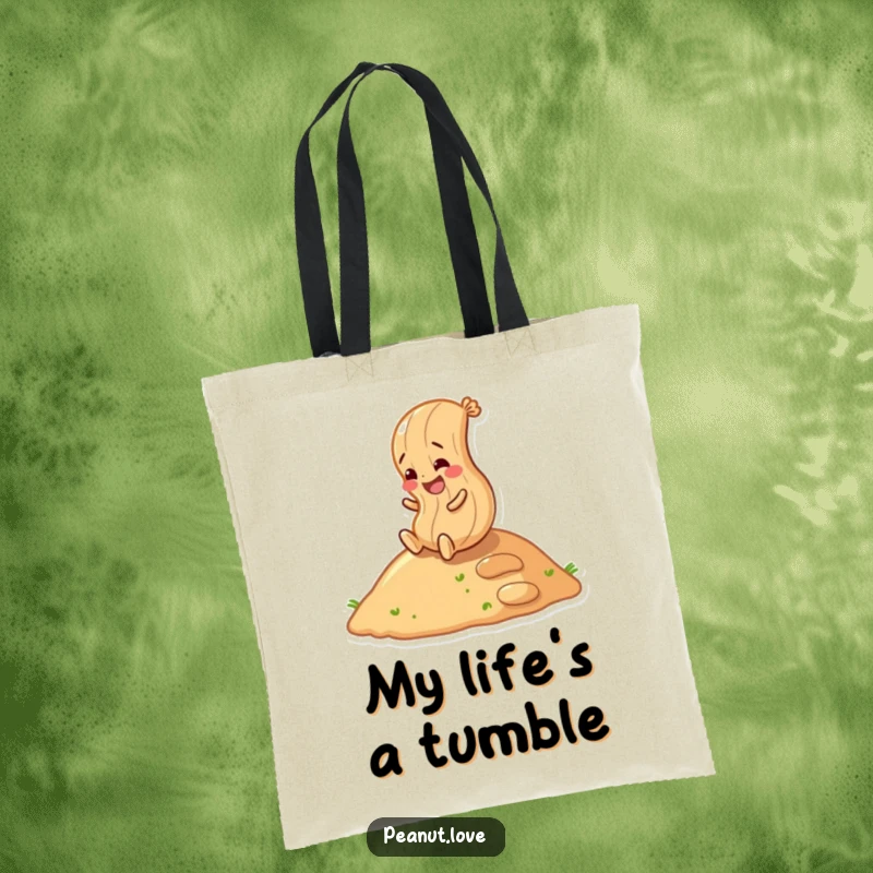 Funny peanut character rolling down a hill with glee, printed on a sturdy tote bag, symbolizing fun and movement.