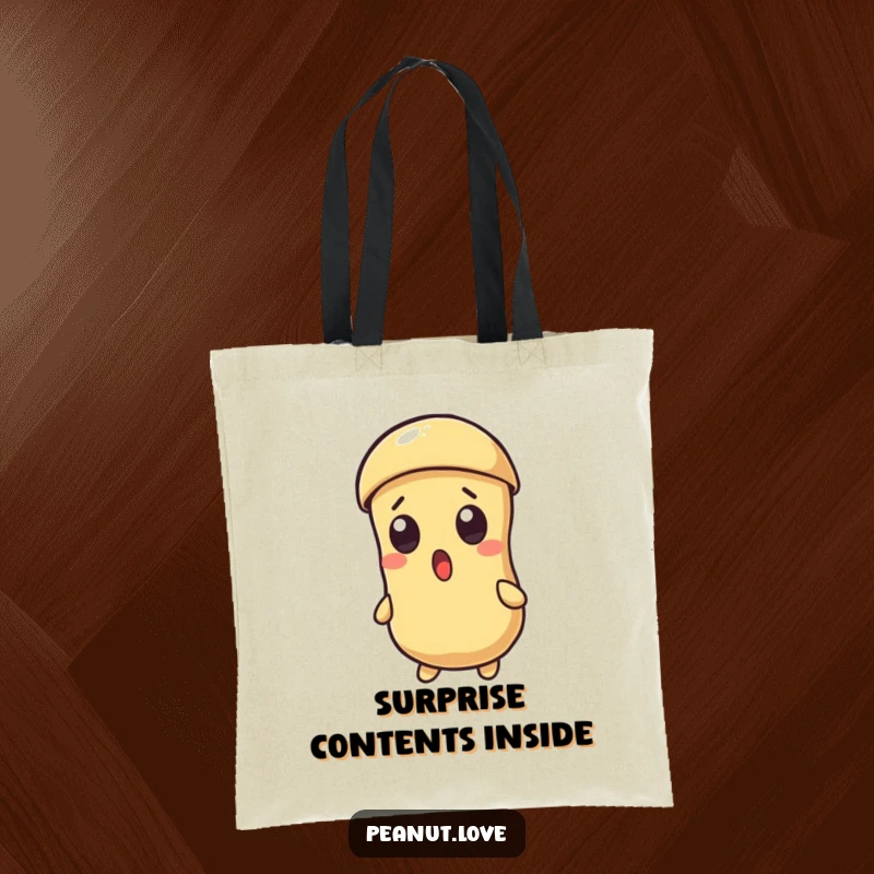 Funny canvas tote bag depicting a surprised Kawaii peanut character with its shell cracking open, great for daily use.