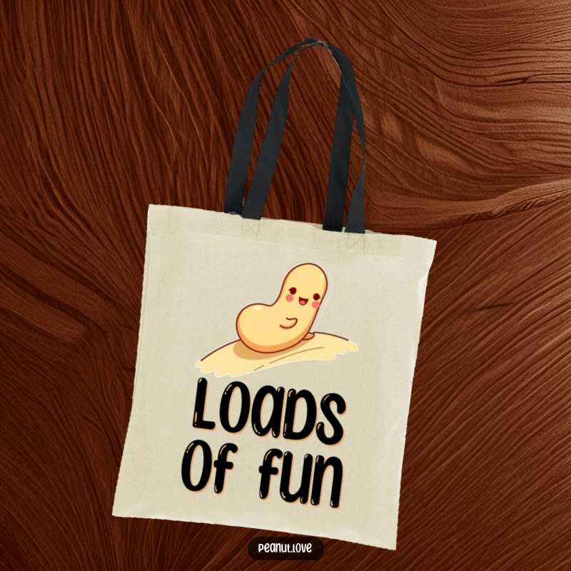 Funny tote bag depicting a playful peanut character rolling down a slope with a happy expression, great for shopping.